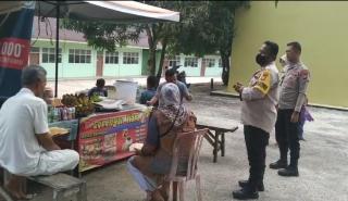 Sampaikan Pesan Pemilu Damai Polsek Bangkinang Barat Sasar Masyarakat di Desa Merangin